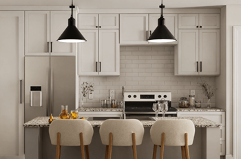 A kitchen with white cabinets and a marble countertop.at The Landings at Hard Scrabble, Columbia, SC